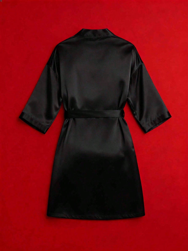 Black satin kimono robe flat lay back view, blank back area for custom personalized text print