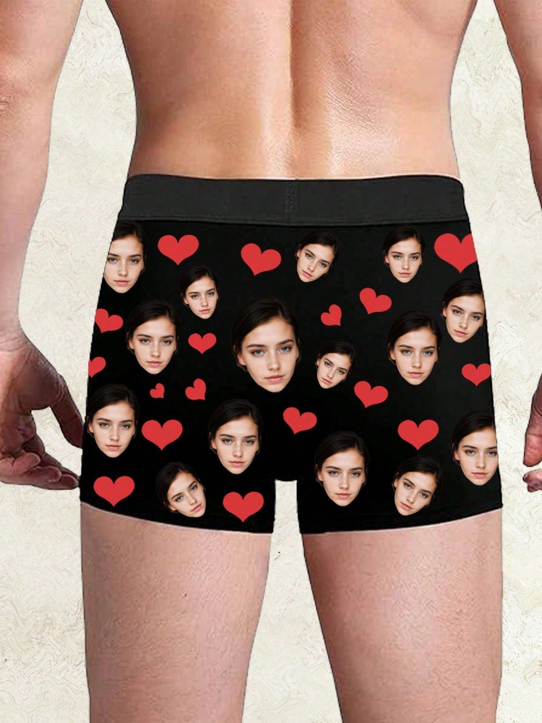 Model wearing custom face men's boxer briefs with red heart pattern and personalized photo print
